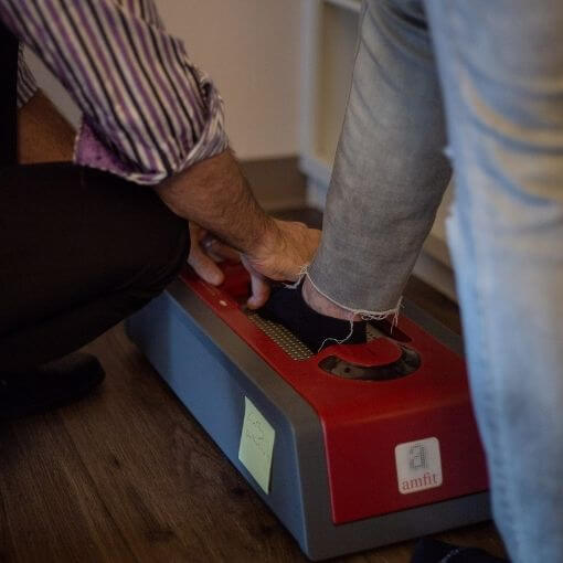 Amfit scanner takes a custom scan of your feet for orthotics
